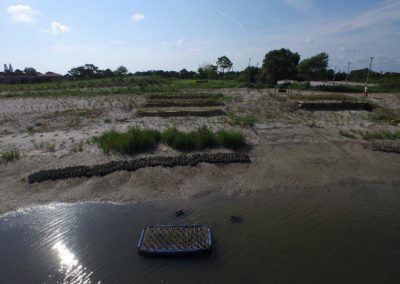 The Shoreline Demonstration Area (from left to right): native plants, native plants with oyster bags, terracing with oyster bags, a kayak launch, a retaining wall with oyster bags